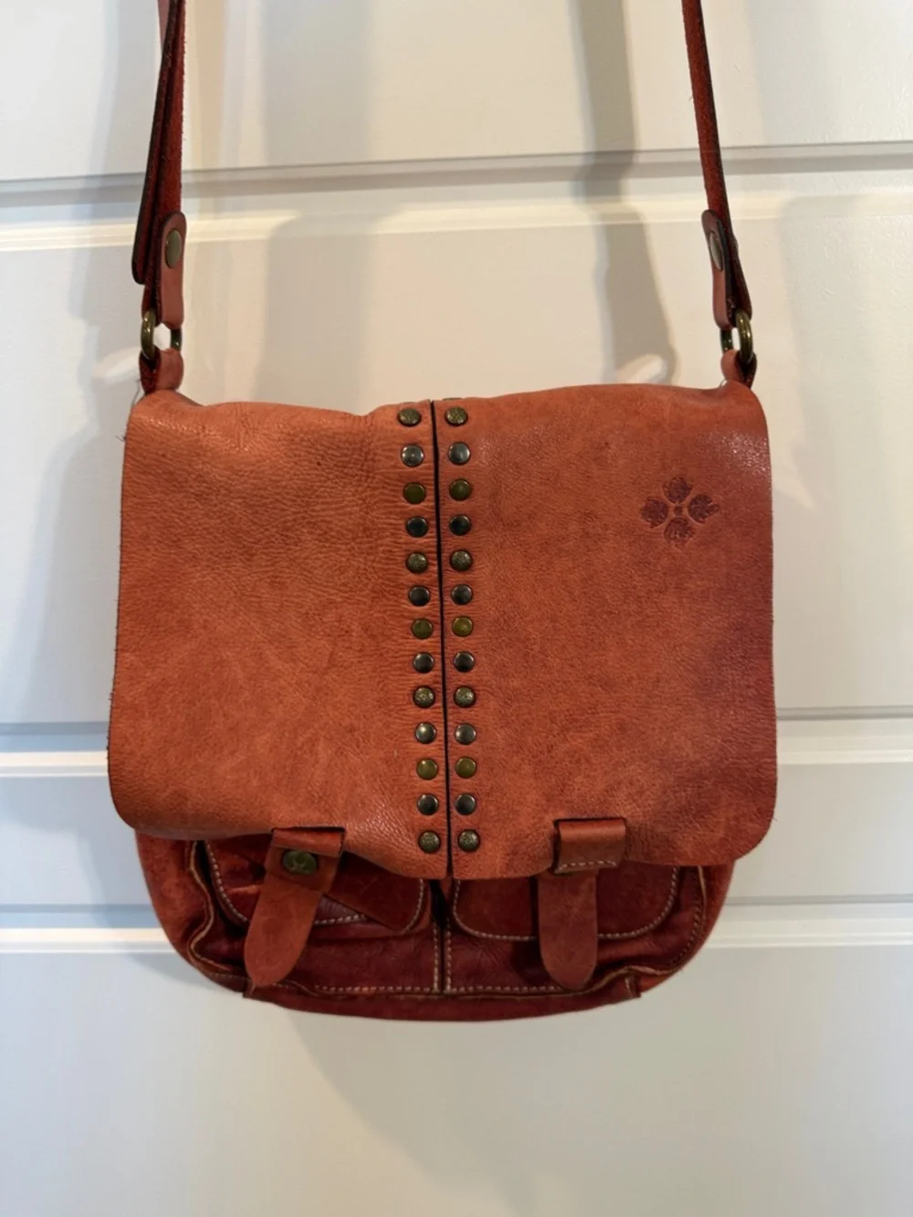 Patricia Nash Armeno Flap Crossbody Messenger Bag, Studs, Berry Red Leather
